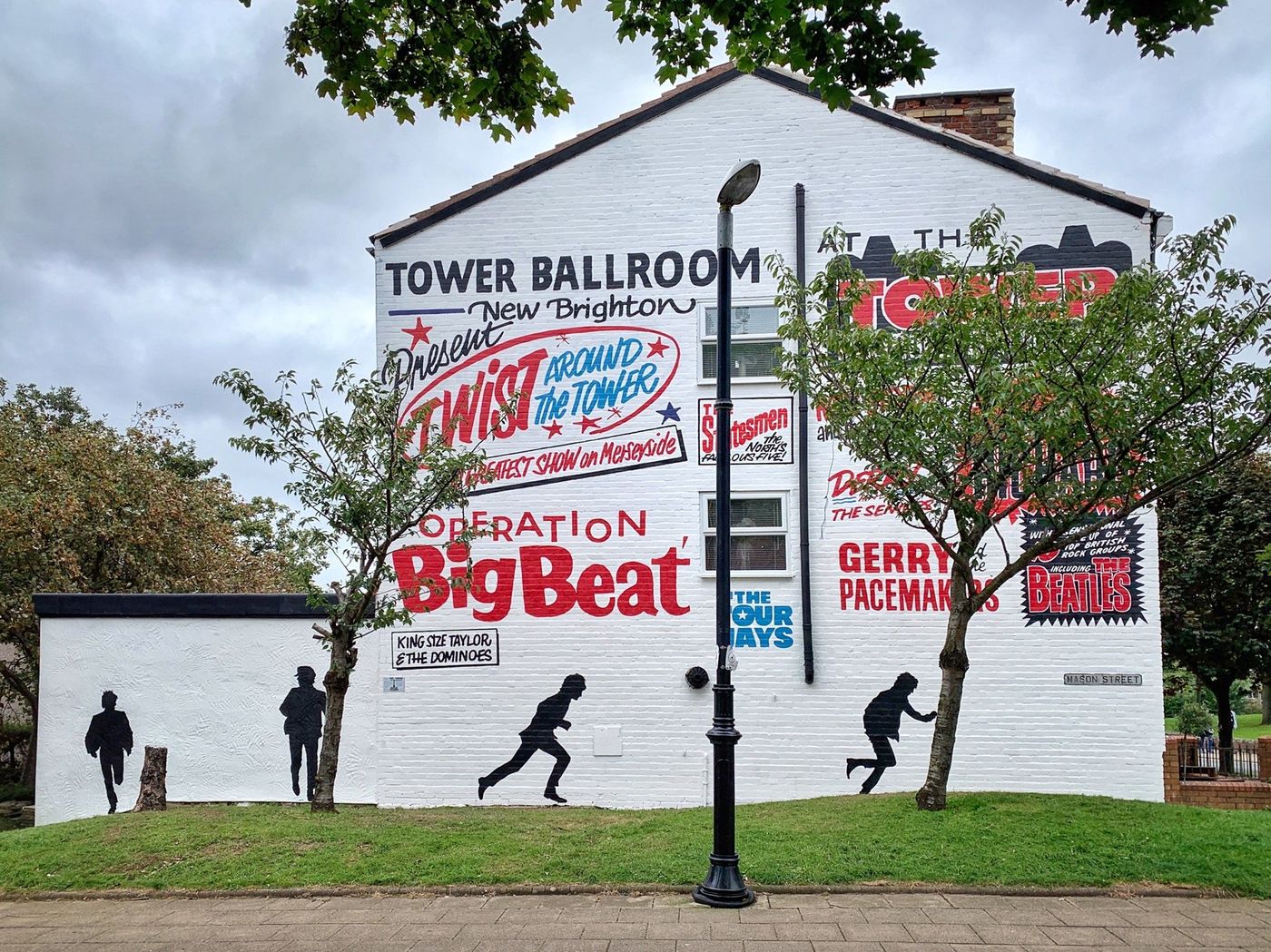 Beatles mural on a gable end in New Brighton, painted by Art From A&K